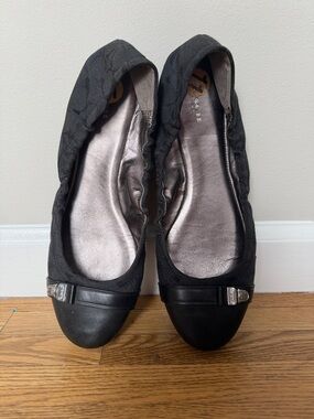 COACH Black Ballet Flats with Metallic Toe Accent